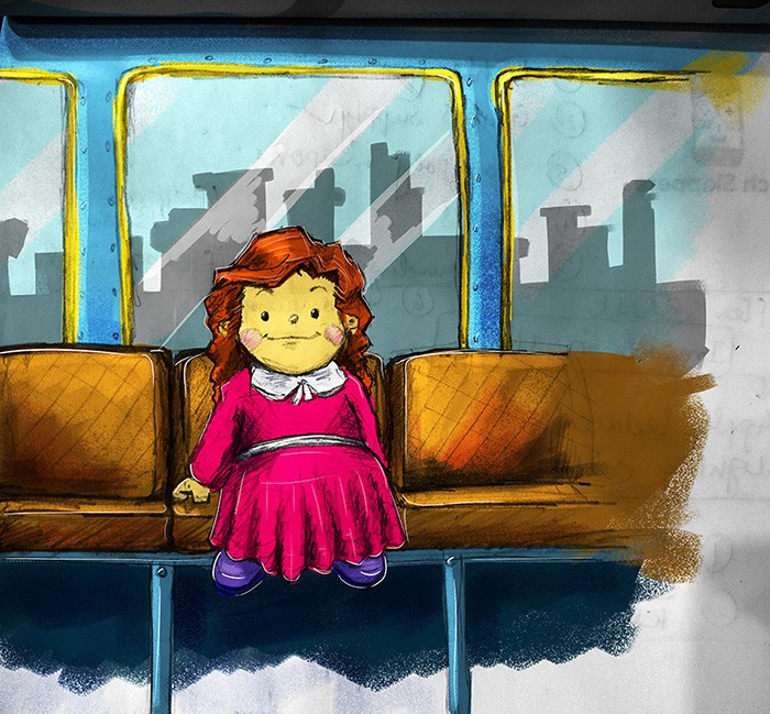 cute girl in pink in train.